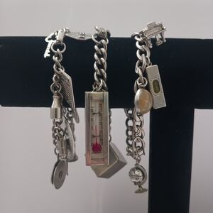 Silver Charm Bracelet with Unique Pendants